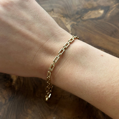 Bracelet 10K Solid Gold Chunky Anchor Link Chain on a model hand 