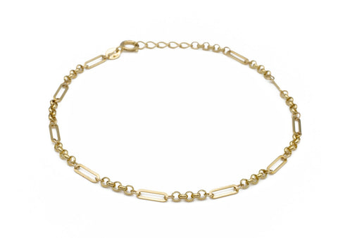 A gold bracelet featuring a combination of round rolo and paperclip chain designs.