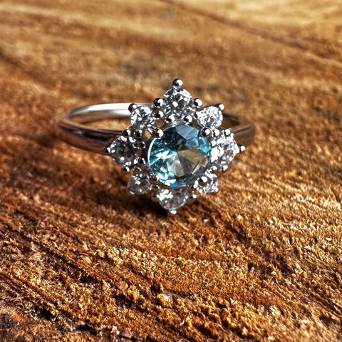  Sterling Silver with rhodium 11 mm flower ring 2mm band Blue cubic zirconia