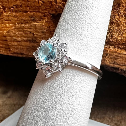 11 Sterling Silver with rhodium 11 mm flower ring 2mm band Blue cubic zirconia