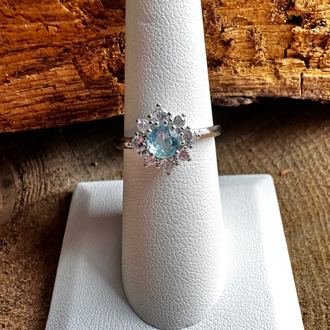 12 Sterling Silver with rhodium 11 mm flower ring 2mm band Blue cubic zirconia