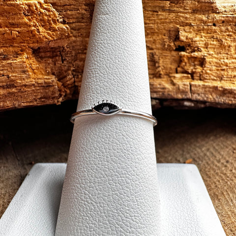 Sterling Silver with rhodium 3x6mm evil eye ring with 1mm cubic zirconia 6