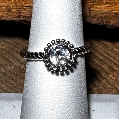 3 Sterling Silver with rhodium flower ring with 5mm cubic zirconia 2mm twisted band