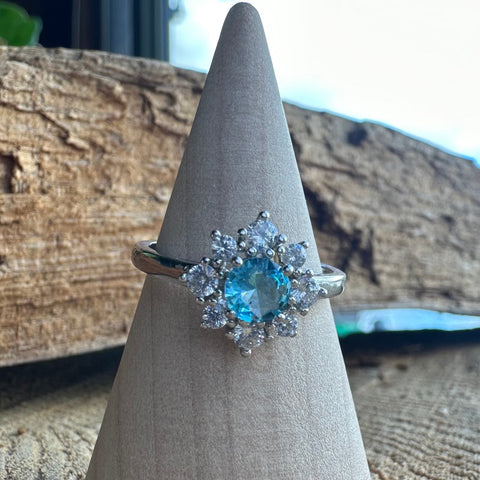 Sterling Silver with rhodium 11 mm flower ring 2mm band Blue cubic zirconia
