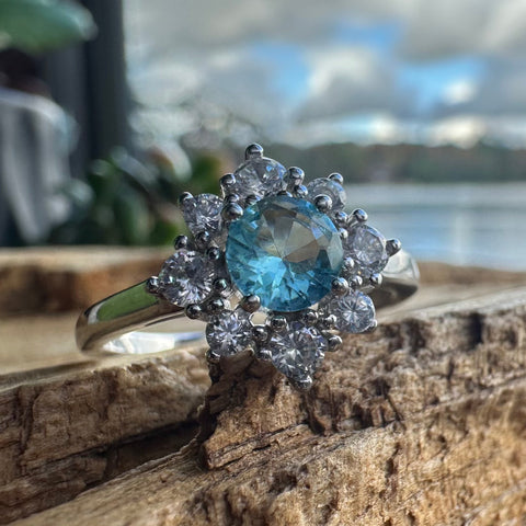 7 Sterling Silver with rhodium 11 mm flower ring 2mm band Blue cubic zirconia