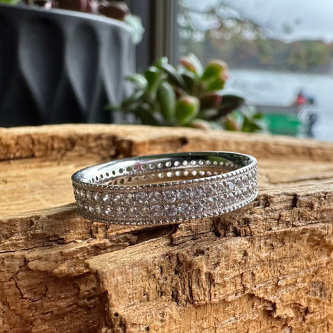 7 Sterling Silver with rhodium cubic zirconia eternity ring with 5mm width band