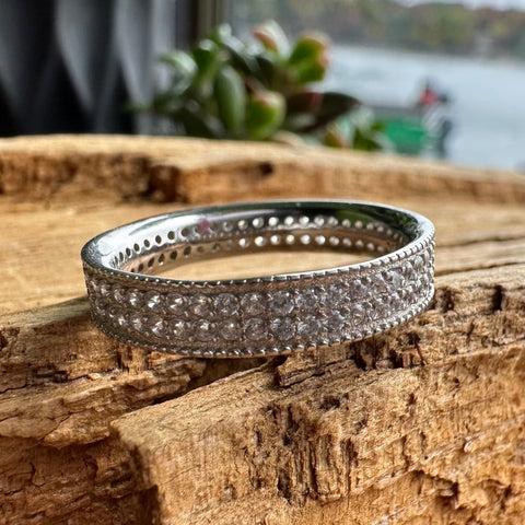 3 Sterling Silver with rhodium cubic zirconia eternity ring with 5mm width band