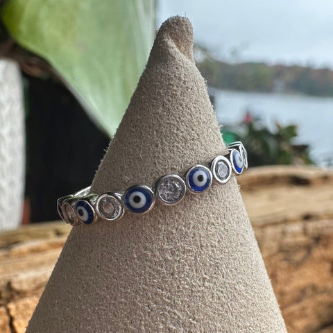 6 Sterling Silver with rhodium 3mm evil eye ring with cubic zirconia