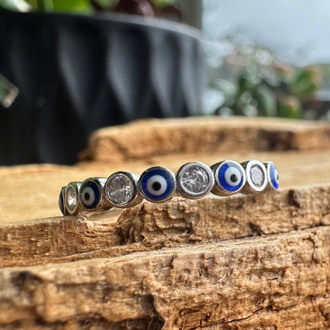 7  Sterling Silver with rhodium 3mm evil eye ring with cubic zirconia