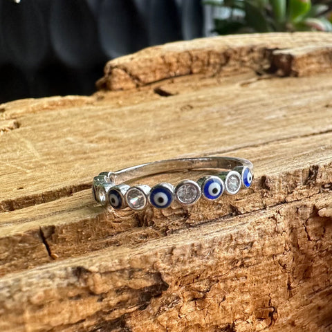 8 Sterling Silver with rhodium 3mm evil eye ring with cubic zirconia