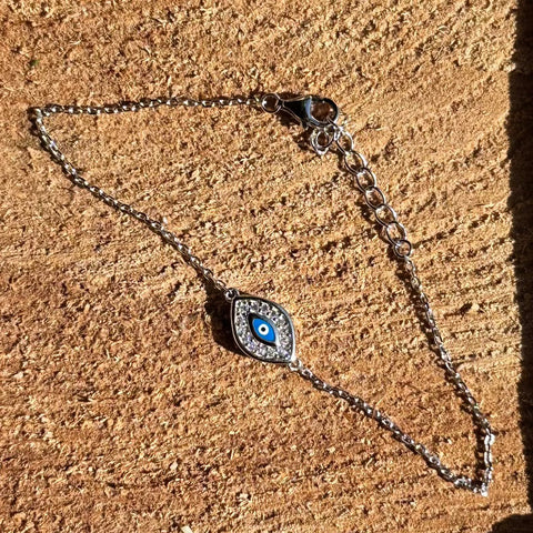 3 Sterling Silver with rhodium 8x12mm evil eye bracelet with cubic zirconia 7"