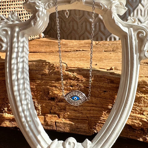 4 Sterling Silver with rhodium 8x12mm evil eye bracelet with cubic zirconia 7"