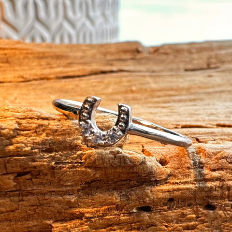 Sterling Silver with rhodium 5mm horseshoe ring with cubic zirconia