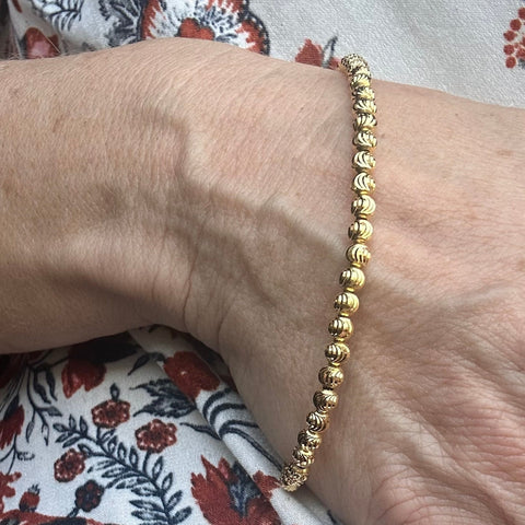 10K Solid Gold  diamond cut beaded bracelet