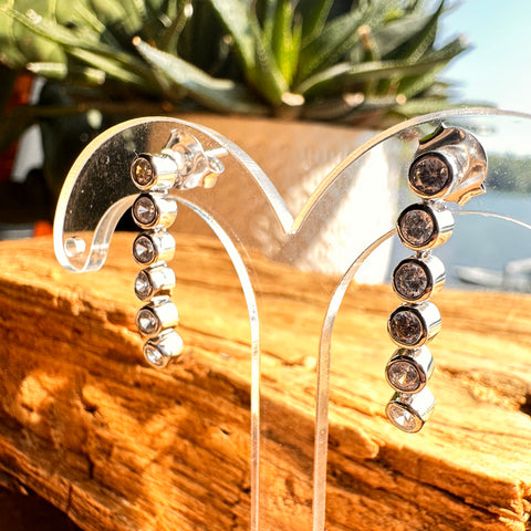 4 Rhodium plated on Sterling Silver faced round shape Cubic Zirconia drop earrings