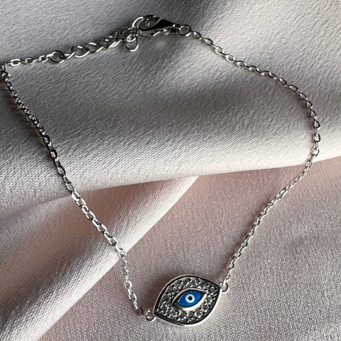 8 Sterling Silver with rhodium 8x12mm evil eye bracelet with cubic zirconia 7"