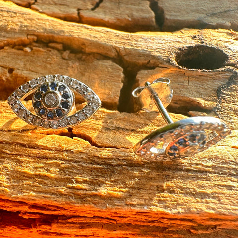 6 Sterling silver with rhodium 7x12mm evil eye stud earring with cubic zirconia