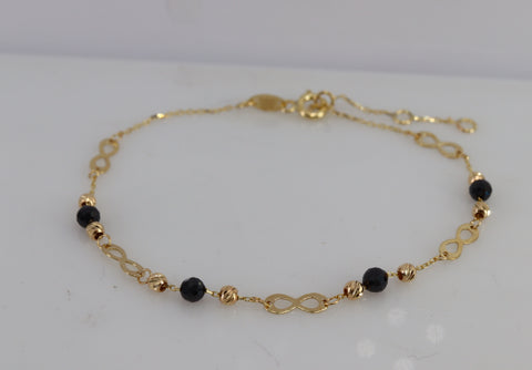 Solid Gold 10K dainty bracelet 3x8mm infinity charm with 3mm onyx bead  diamond cut bead
