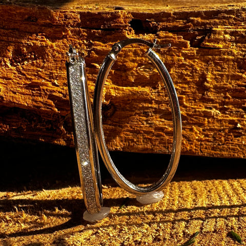 2 Rhodium plated on Sterling Silver, oval shape hoop earrings with stardust finish