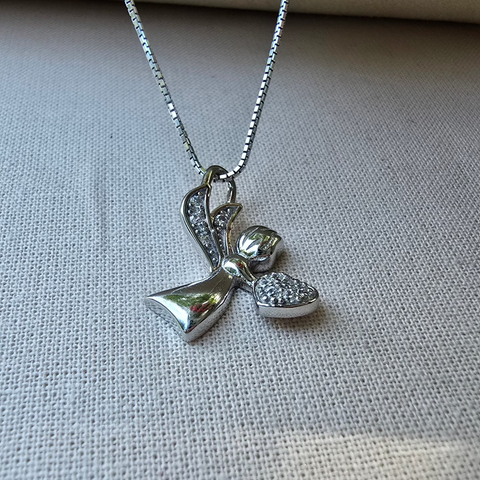 Rhodium plated on Sterling Silver, fancy Angel shape stone pendant. Approx pendant size: 20mm L x 16mm W 3