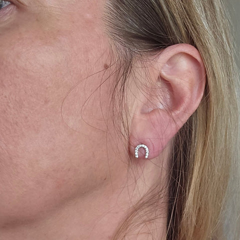 Sterling silver with rhodium, 6.5x7mm horseshoe stud earrings with cubic zirconia 8