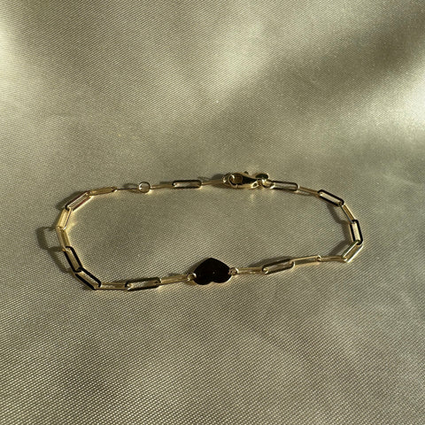Bracelet paperclip with flat heart charm attached to it, parrot clasp for closing. Gold plated on Sterling Silver 925, Vermeil.
