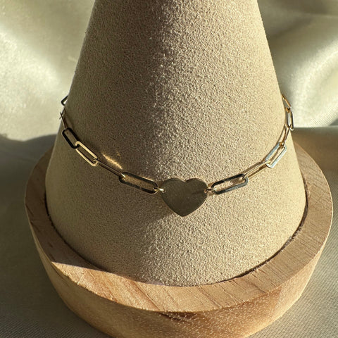 Bracelet paperclip with flat heart charm attached to it, parrot clasp for closing. Gold plated on Sterling Silver 925, Vermeil.
