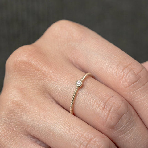 Ring 10K Solid Gold Rope with bezel set CZ