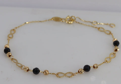Solid Gold 10K dainty bracelet 3x8mm infinity charm with 3mm onyx bead  diamond cut bead