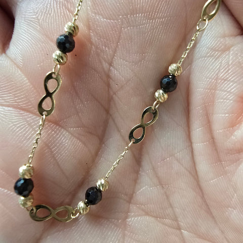 Solid Gold 10K dainty bracelet 3x8mm infinity charm with 3mm onyx bead  diamond cut bead