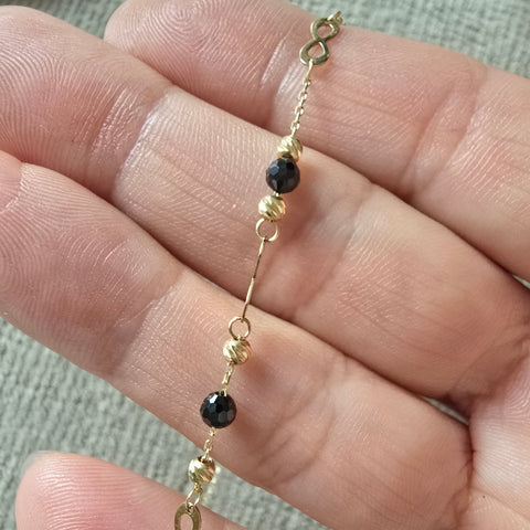 Solid Gold 10K dainty bracelet 3x8mm infinity charm with 3mm onyx bead  diamond cut bead