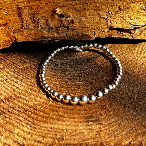 Bracelet AMINA  Sterling Silver Elastic Bracelet with Graduated Ball Beads