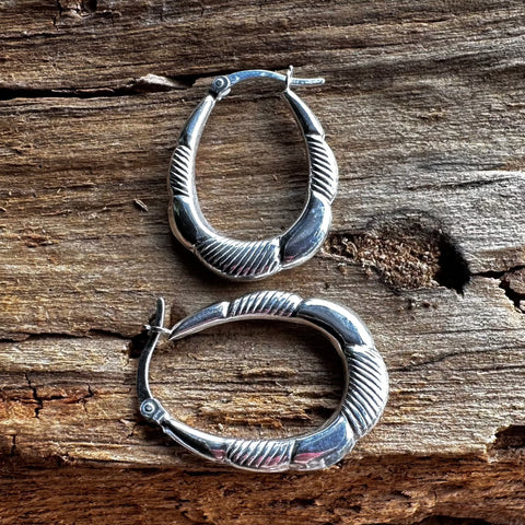 7 Sterling Silver fancy style oval shape hoop with a Hinge Back